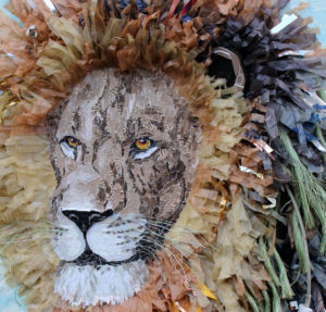 "Discarded" mixed media found object lion collage by Tamara Jaeger